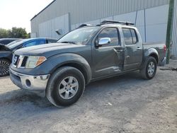 Salvage cars for sale from Copart Apopka, FL: 2006 Nissan Frontier Crew Cab LE