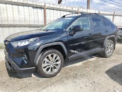 Salvage cars for sale at Los Angeles, CA auction: 2021 Toyota Rav4 XLE Premium