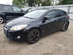 Salvage cars for sale from Copart Riverview, FL: 2014 Ford Focus SE