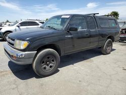 Salvage cars for sale from Copart Bakersfield, CA: 1999 Toyota Tacoma Xtracab