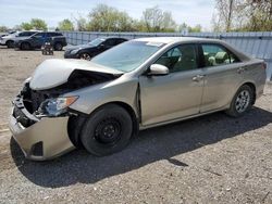 Salvage cars for sale from Copart London, ON: 2014 Toyota Camry L