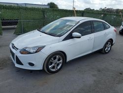 Salvage cars for sale from Copart Orlando, FL: 2013 Ford Focus SE