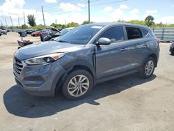 Salvage cars for sale from Copart Miami, FL: 2018 Hyundai Tucson SE