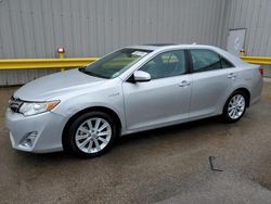 Salvage cars for sale at New Orleans, LA auction: 2012 Toyota Camry Hybrid