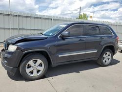 Salvage SUVs for sale at auction: 2012 Jeep Grand Cherokee Laredo