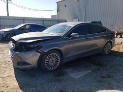 Salvage cars for sale from Copart Jacksonville, FL: 2014 Ford Fusion Titanium HEV