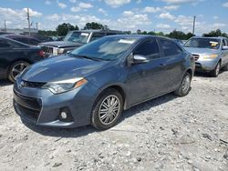 Salvage cars for sale at auction: 2015 Toyota Corolla L