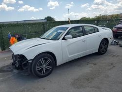 Salvage cars for sale from Copart Orlando, FL: 2014 Dodge Charger SXT