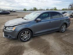 Salvage cars for sale from Copart London, ON: 2014 Volkswagen Jetta TDI