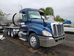 Salvage trucks for sale at Woodburn, OR auction: 2014 Freightliner Cascadia 125