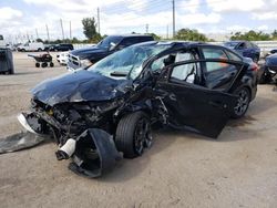 Salvage cars for sale from Copart Miami, FL: 2014 Ford Focus SE