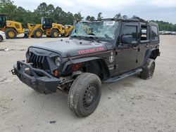 Salvage cars for sale from Copart Hampton, VA: 2011 Jeep Wrangler Unlimited Sport