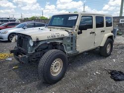Salvage cars for sale at Homestead, FL auction: 2011 Jeep Wrangler Unlimited Sahara