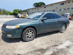 Salvage cars for sale at Opa Locka, FL auction: 2000 Toyota Camry Solara SE