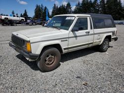 Salvage trucks for sale at Graham, WA auction: 1989 Jeep Comanche Pioneer