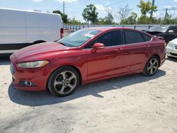 Salvage cars for sale from Copart Riverview, FL: 2013 Ford Fusion SE