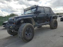 Salvage cars for sale from Copart Orlando, FL: 2010 Jeep Wrangler Unlimited Sport