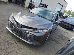 Salvage cars for sale at Woodburn, OR auction: 2018 Toyota Camry Hybrid