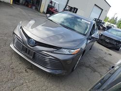 Vehiculos salvage en venta de Copart Woodburn, OR: 2018 Toyota Camry Hybrid