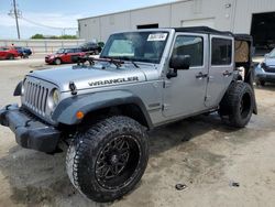 Salvage cars for sale from Copart Jacksonville, FL: 2015 Jeep Wrangler Unlimited Sport