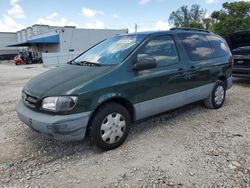 Salvage cars for sale from Copart Opa Locka, FL: 1999 Toyota Sienna LE