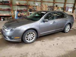 Salvage cars for sale from Copart Ontario Auction, ON: 2012 Ford Fusion SEL