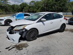 Salvage cars for sale from Copart Fort Pierce, FL: 2012 Ford Focus SEL