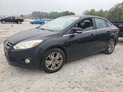 Salvage cars for sale from Copart Houston, TX: 2012 Ford Focus SEL