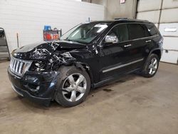 Vehiculos salvage en venta de Copart Blaine, MN: 2011 Jeep Grand Cherokee Overland