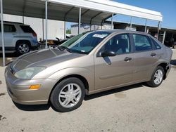 Salvage cars for sale from Copart Fresno, CA: 2004 Ford Focus SE Comfort