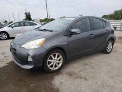 Salvage cars for sale from Copart Miami, FL: 2013 Toyota Prius C