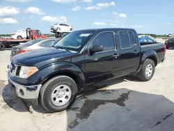 Salvage trucks for sale at Grand Prairie, TX auction: 2008 Nissan Frontier Crew Cab LE
