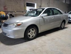 Salvage cars for sale from Copart Blaine, MN: 2002 Toyota Camry LE