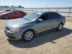 Salvage cars for sale at Bakersfield, CA auction: 2011 Volkswagen Jetta SE