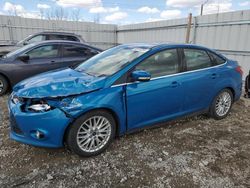 Salvage cars for sale from Copart Nisku, AB: 2014 Ford Focus Titanium