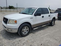 Salvage cars for sale from Copart Haslet, TX: 2005 Ford F150 Supercrew