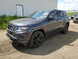 Vehiculos salvage en venta de Copart Portland, MI: 2014 Jeep Grand Cherokee Laredo