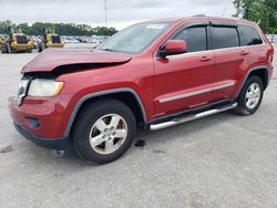 Jeep Grand Cherokee salvage cars for sale: 2011 Jeep Grand Cherokee Laredo