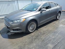 Salvage cars for sale at Opa Locka, FL auction: 2014 Ford Fusion Titanium
