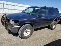 Salvage cars for sale from Copart Nisku, AB: 1997 Nissan Pathfinder LE