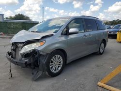 Salvage cars for sale at Orlando, FL auction: 2013 Toyota Sienna XLE