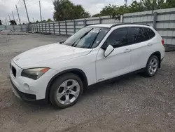 Salvage cars for sale at Miami, FL auction: 2014 BMW X1 SDRIVE28I