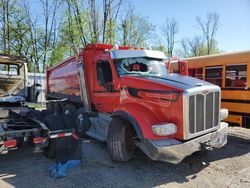 Salvage trucks for sale at Milwaukee, WI auction: 2014 Peterbilt Dumptruck
