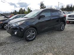 Salvage cars for sale from Copart Graham, WA: 2015 Hyundai Tucson Limited