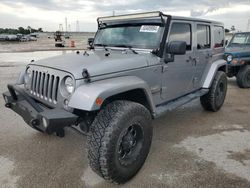 Salvage cars for sale at Houston, TX auction: 2014 Jeep Wrangler Unlimited Sahara