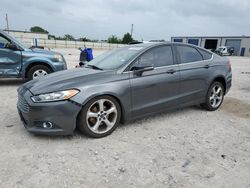 Salvage cars for sale from Copart Haslet, TX: 2015 Ford Fusion SE