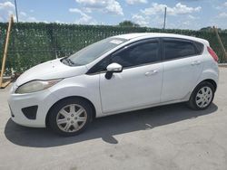 Salvage cars for sale from Copart Orlando, FL: 2013 Ford Fiesta SE