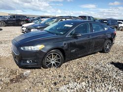 Salvage cars for sale at Magna, UT auction: 2014 Ford Fusion Titanium Phev