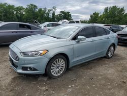 Salvage cars for sale at Baltimore, MD auction: 2013 Ford Fusion SE Hybrid