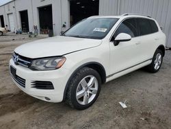 Salvage cars for sale from Copart Jacksonville, FL: 2011 Volkswagen Touareg Hybrid